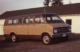 Passenger van parked on campus.