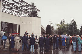 Guests, students, and staff gathered near the main entrance of the newly dedicated Neufeld Scienc...