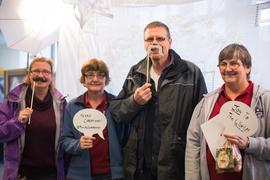 Building Services staff in the Christmas photo booth