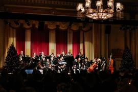 Calvin Dyck conducting an orchestra during the Christmas in the City gala