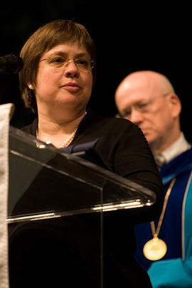 Allyson Nelson accepting an honorary degree on behalf of her father, Ray Nelson