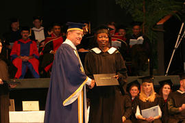 President Snider with an unidentified graduating student