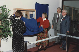 Wendy and Heather Alloway unveiling a plaque honouring their mother, Norma