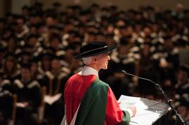 Harold Faw presenting the commencement address at Grad 2013