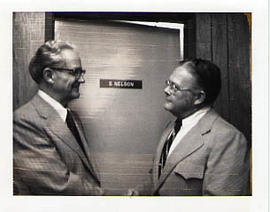 Stanley Nelson shaking hands with a gentleman