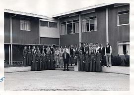 Choir posing outside Douglas Hall