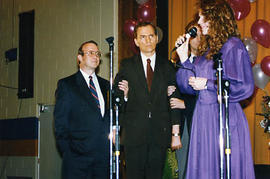 Student singing during a retirement party