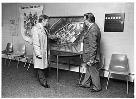 Robert Thompson and Austen Torrell loking at a campus plan