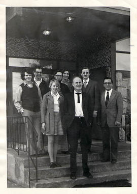 Faculty members posing outside