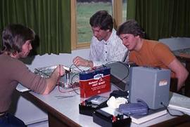 Students working on a physics project.