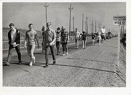 Students walking along Glover Road during the Walk-a-thon