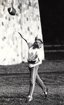 Student throwing a football