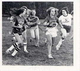 Female students playing a game of football