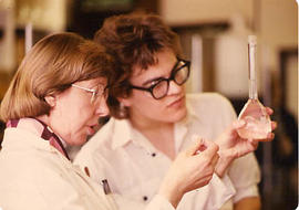 Faculty member helping a student in the lab