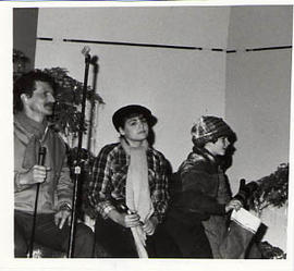 Students performing a skit during a Christmas Banquet