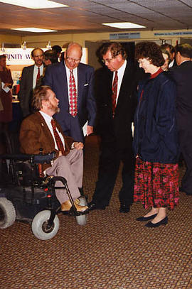 Guest speaker talking with visitors