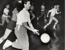 Female students playing basketball during an Intramural