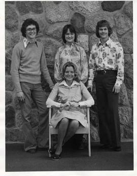 Members of Real Joy posing together in the chapel