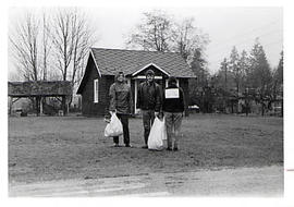 Students standing in the rain during the Work-a-thon