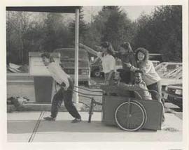 Commuter Life Assistants posing in David Thompson's cart