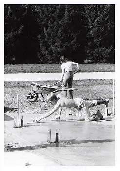 Students spreading cement during the Work-a-thon