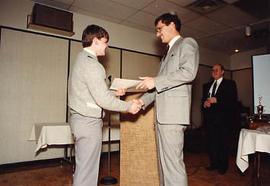 Matt Edwards presenting an award