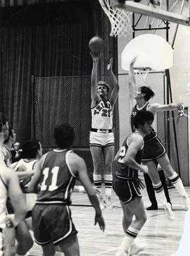 Harv Engelbrecht making a lay-up in a basketball game.