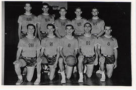 Men's basketball team posing in uniform