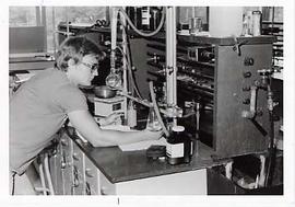 Student performing a chemistry experiment