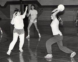 Female students playing basketball during an Intramural