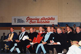 Administrators and faculty in academic regalia