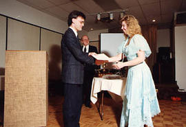 David Thomas presenting a scholarship