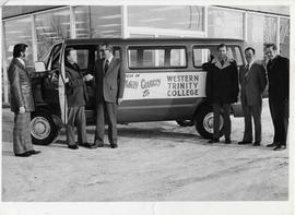 Presentation of a Chrysler van to Robert N. Thompson