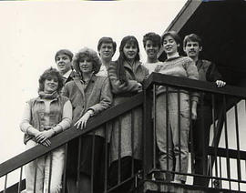 The Publicity Committee posing on a balcony