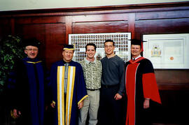 President's interns standing with some administrators