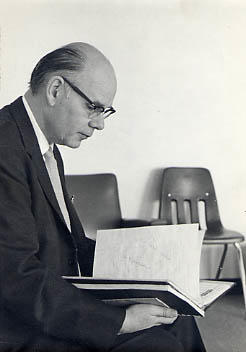 Robert Snyder seated on a chair