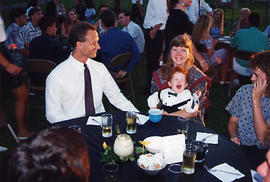 Alumnus at a picnic at Trinity