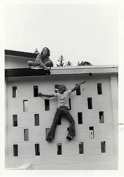 Students painting a wall during the Work-a-thon