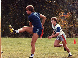 Two male students playing in a game