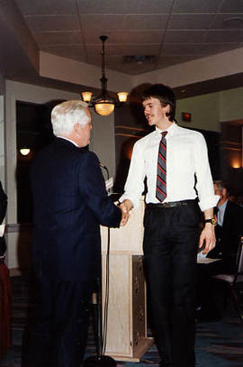 Lance Davies receiving an award