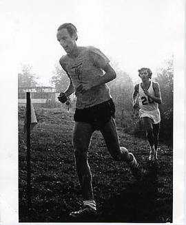 Track and Field Team member running a race