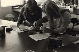 Two students performing a dissection