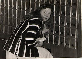 Student in the Douglas Hall mailroom