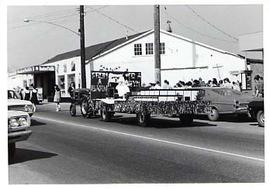 Tractor pulling TJC parade float