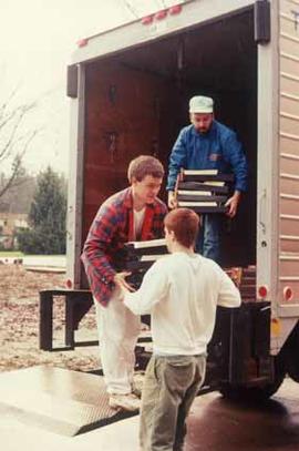 Allan Kotanen and two student workers unloading  the card catalogue