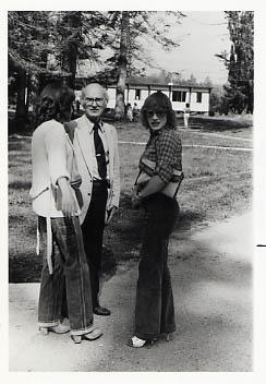 Richard Walters standing outside with students