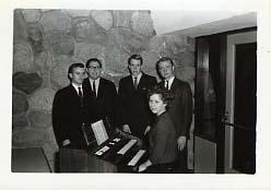 Men's Quartet posing in the chapel