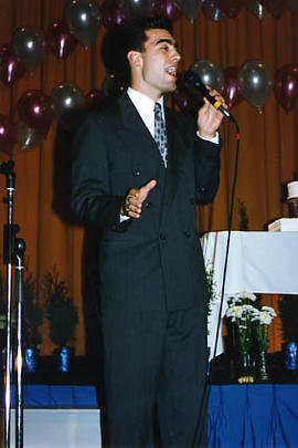 Student performing during a retirement party