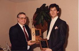 Mission Aviation Fellowship of Canada member presenting an award