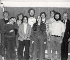 Spiritual Life Committee posing in front of a curtain